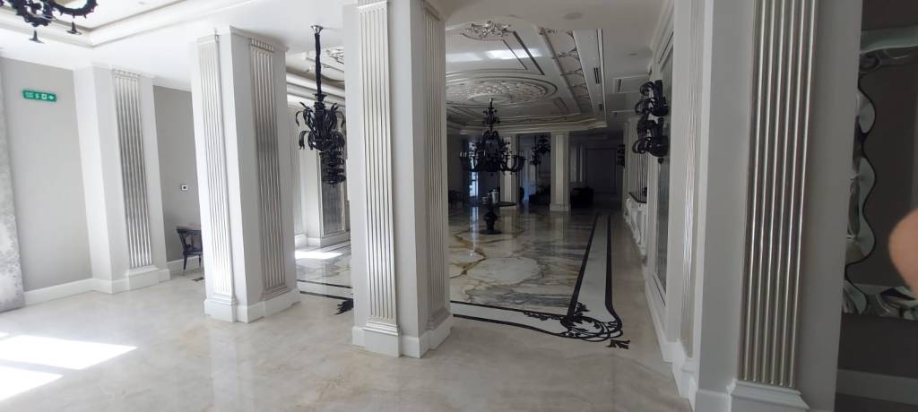 Elegant lobby renovation with co-working and social hub potential